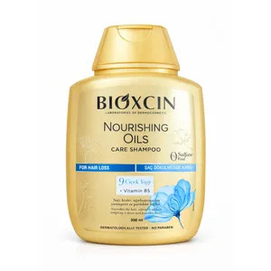 شامپو ضد ریزش مو بیوکسین مدل روغن 9 گیاه مناسب موهای خشک و اسیب دیده 300 میل مدل Bioxcin Nourishing Oils